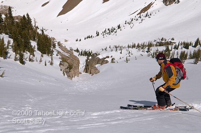 Steve looks into the gut of the chute and is hating the mushy snow conditions