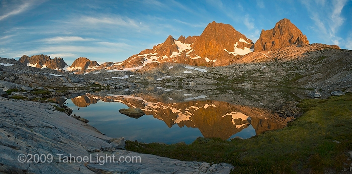Panoramic shot of sunrise and reflection at the base of Ritter peak as seen from the headwaters above Nydiver Lake in the Ansel Adams wilderness. This was day 4 of a 5 day cross country route that was a version on the popular Minaret Lake-Thousand Island Lake loop.