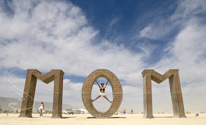 A giant sculpture spelling MOM was one of the favorite spots for people to take photos, like Yvette Deighton, pictured.  