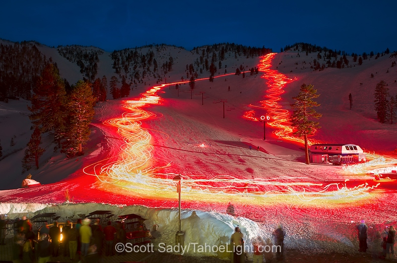slide lodge torchlight parade on skis