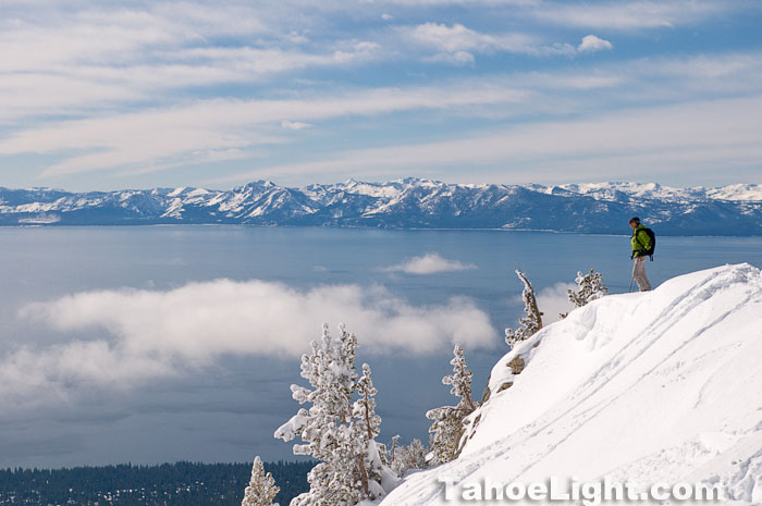 lake tahoe views in winter skier on top of incline peak
