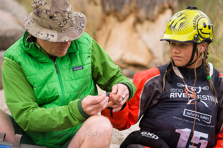 Sage and her dad Matt testing Sage's blood sugar. Sage has juvenile diabetes and most constantly monitor and control her blood sugar, especially around competition time. Sage, despite being only 13 years old, has gone on to best nearly the entire adult women's field in freestyle kayaking and steep creek racing. 