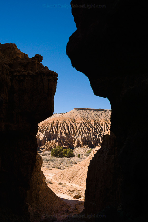 Looking out at the walls of Cathedral Gorge from inside one of the many small slot-canyons.