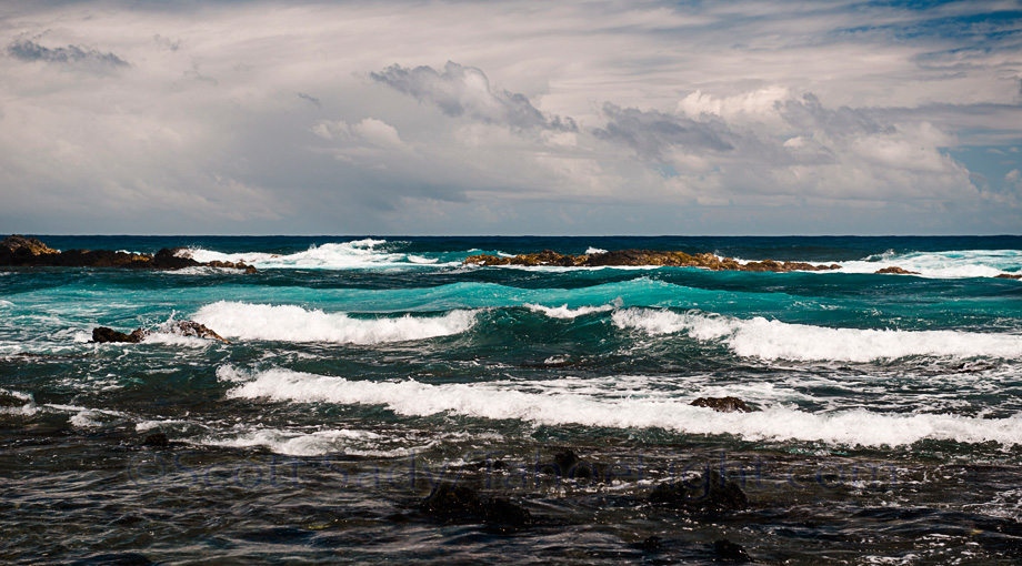 The cleanest air in the world is supposedly at Cape Kumaukahi Point on the big island of Hawaii. Apparently the air currents that travel over this point cross over 3000 miles of open sea and nothing else before reaching here. Scientific instruments are scattered here and there taking air quality readings, and there are some cool hot springs, called the Champagne Pond that go right into the ocean and where sea turtles like to hang out.