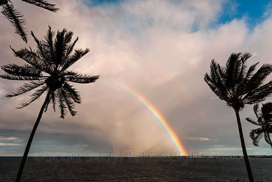 Rainbow over the airport in Hilo as planes com in for landings.