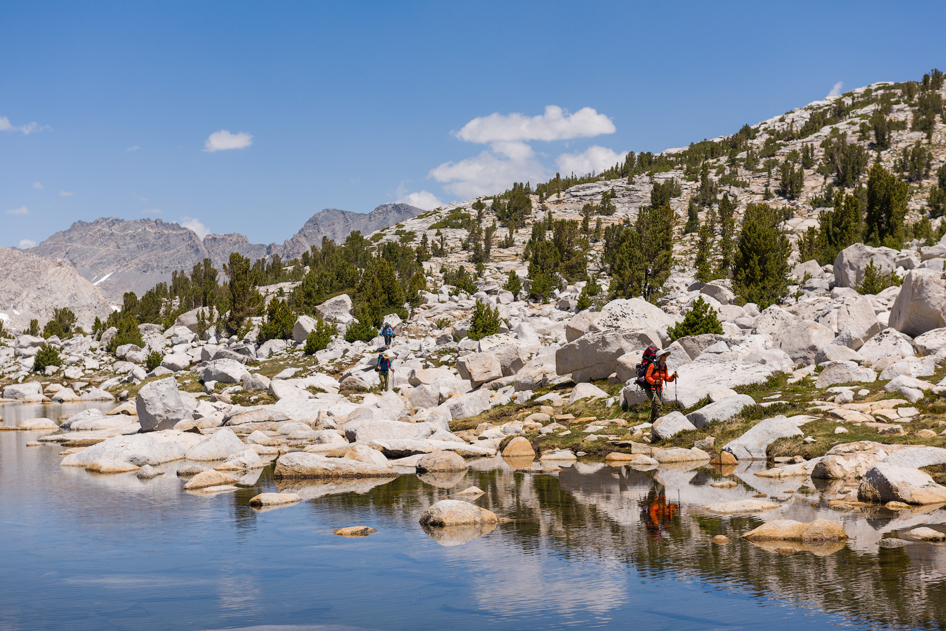 There are two small lakes on Pine Creek Pass itself. The pass is one of the widest I have encountered, with at least a 1/4 mile flat section at the top before a gradual decent on the other side.