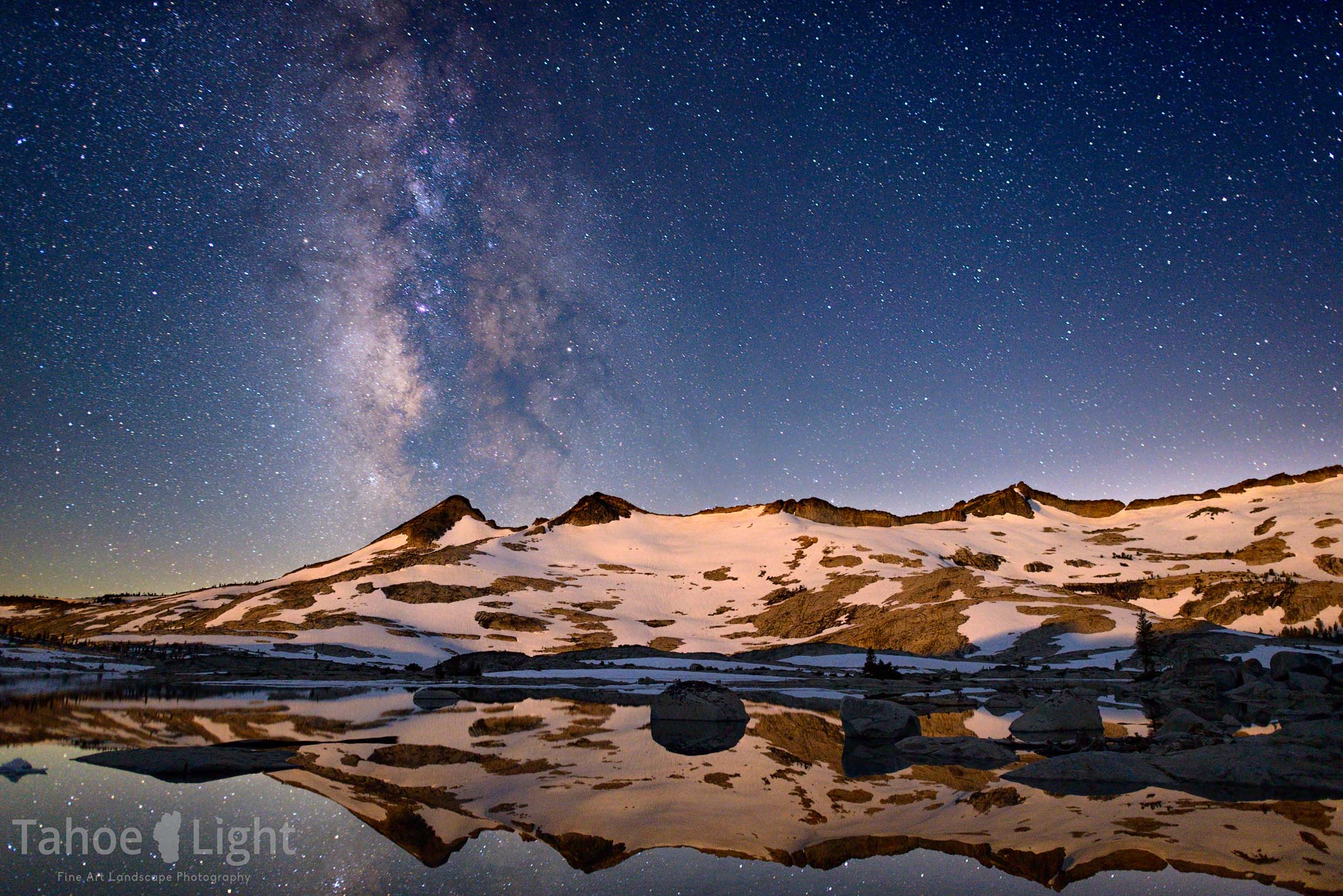 stars and snowy mountain landscape