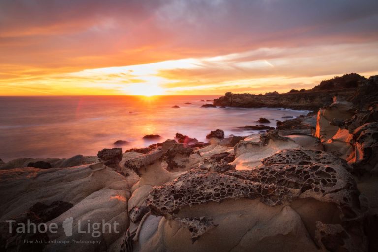 Tafoni rocks at sunset along the pacific ocean