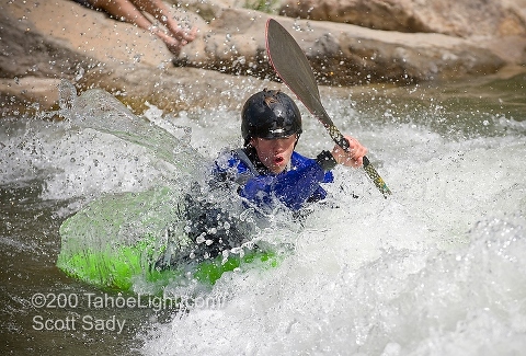 Jonathan Shales competes in the junior freestyle kayak division at the Reno River Festival.