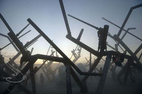 Dust storm in the giant art installation that I refer to as the metal bird's nest out on the playa at Burning Man