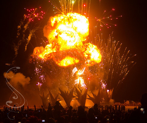 A giant ball of flame is the ignition source for the man during the culmination of the Burning Man Project in the black rock desert on Saturday Night.
