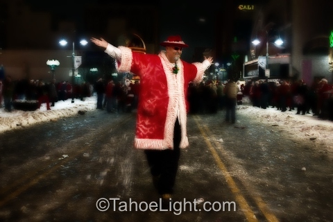 Pimp Santa strolling the "Gauntlet of death," between opposing fields of snowball throwers under the Reno Arch.