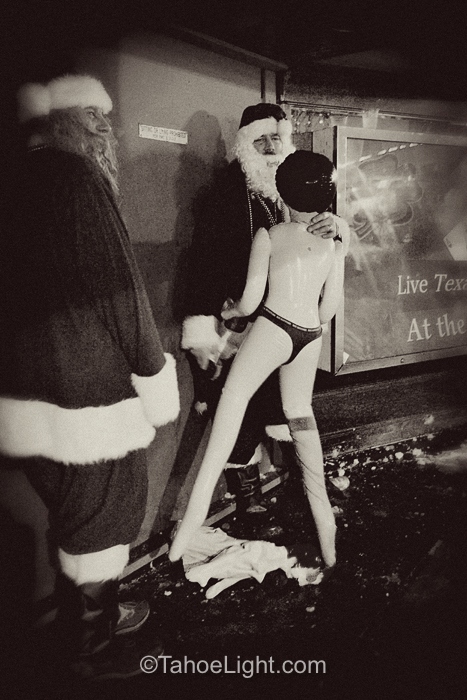 Sometimes, naughty Santa just hides in a dark corner with his date.