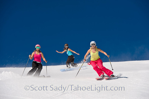 girls skiing in tank tops