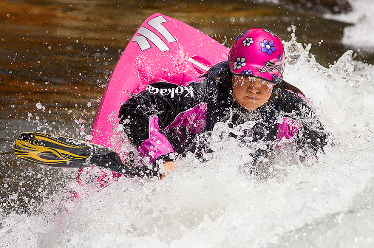 Former women's world champion Emily Jackson's intense concentration comes through the water clinging to her helmet brim.