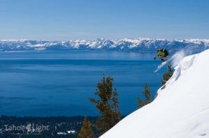 skier with lake tahoe in background