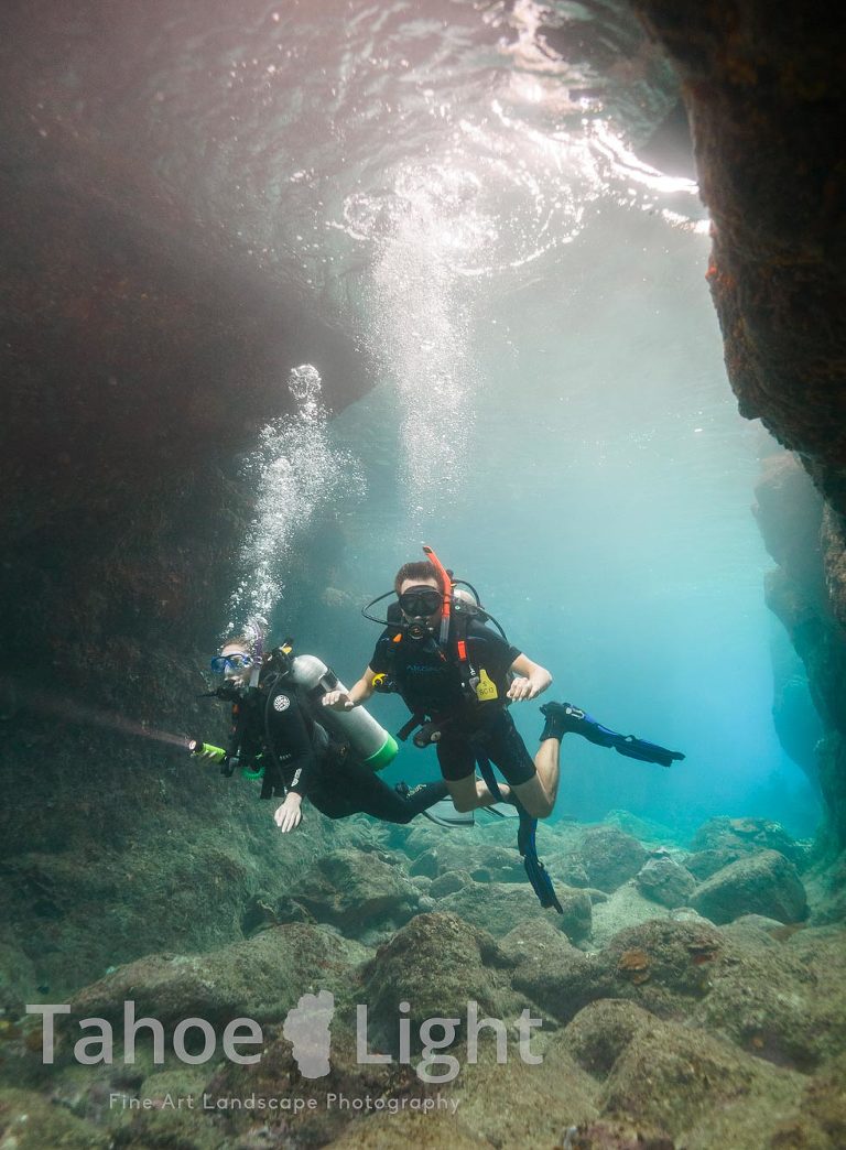 SCUBA diving through a cave